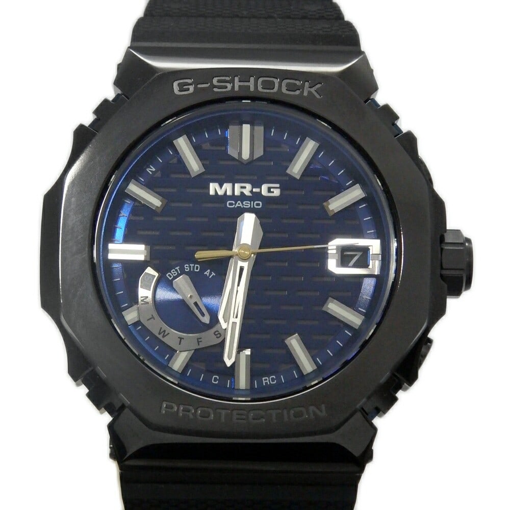 Casio MR-G Titanium Solar Men's Wristwatch: Casio MR-G Titanium Solar Men's Wristwatch This Casio G-SHOCK MR-G MRG-B2100R-2AJR is a men's wristwatch crafted from titanium and powered by solar technology. Made in Japan, it combines durability wi