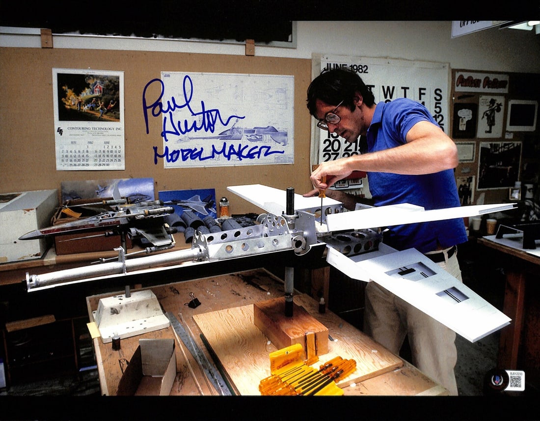 11x14 Rebel X-Wing Photo Signed by ILM Artist Paul Huston Beckett Authenticated: 11x14 Rebel X-Wing Photo Signed by ILM Artist Paul Huston Beckett Authenticated This is an original 11x14 color photograph featuring the Rebel X-Wing Fighter from Star Wars, autographed in blue perman