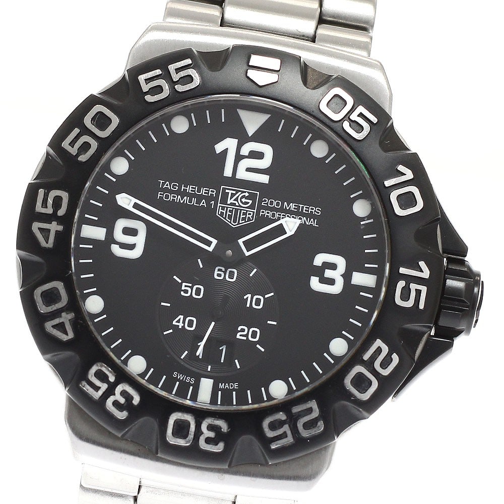 TAG Heuer Formula 1 Grand Date Quartz Steel Men's Watch WAH1010: TAG Heuer Formula 1 Grand Date Quartz Steel Men's Watch WAH1010 This TAG Heuer Formula 1 Grand Date Small Seconds men's wristwatch features a stainless steel case and bracelet with a black dial. The w