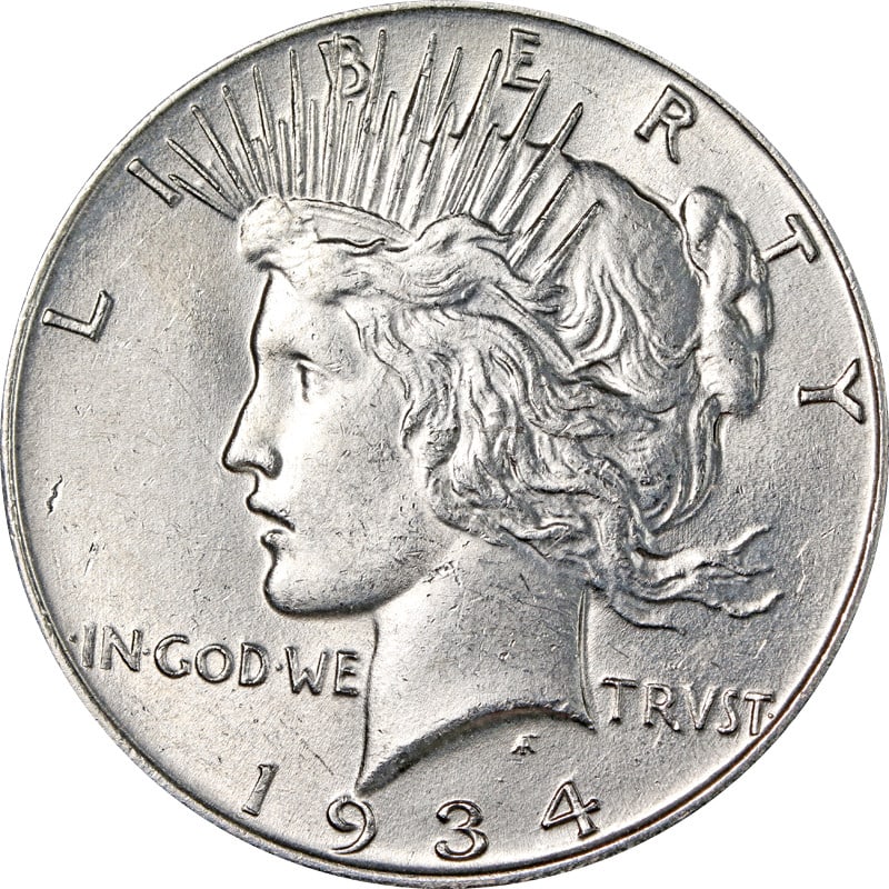 1934 Philadelphia Silver Peace Dollar United States Coin: 1934 Philadelphia Silver Peace Dollar United States Coin This is a 1934-P Peace Dollar coin from the United States. It is a circulated, pre-owned piece made of silver with a fineness of 0.9. The coin 