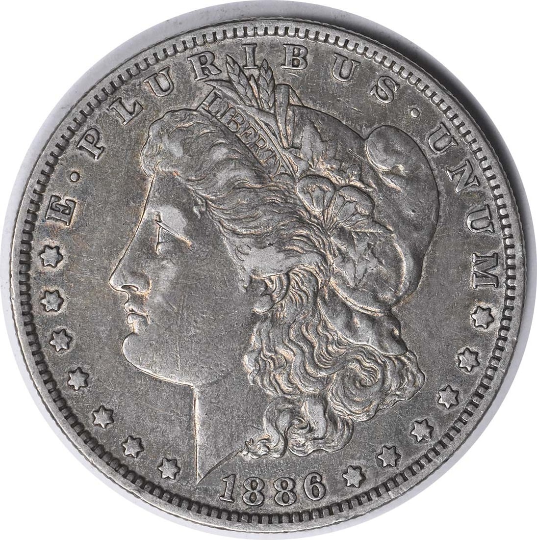 1886-O VAM 1A Morgan Silver Dollar Uncertified 90% Silver Coin: 1886-O VAM 1A Morgan Silver Dollar Uncertified 90% Silver Coin This 1886-O VAM 1A Morgan Silver Dollar is a remarkable piece of numismatic history. Featuring a striking design by George T. Morgan, thi