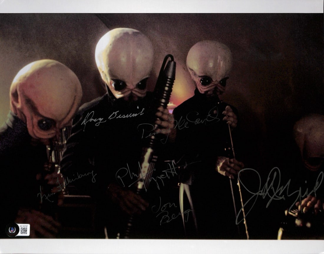 Beckett LOA 11x14 Star Wars Cantina Band photo signed by 6: Beckett LOA 11x14 Star Wars Cantina Band photo signed by 6 This is an original 11x14 color photograph featuring the legendary Cantina Band from Star Wars, signed in silver permanent marker by six acto