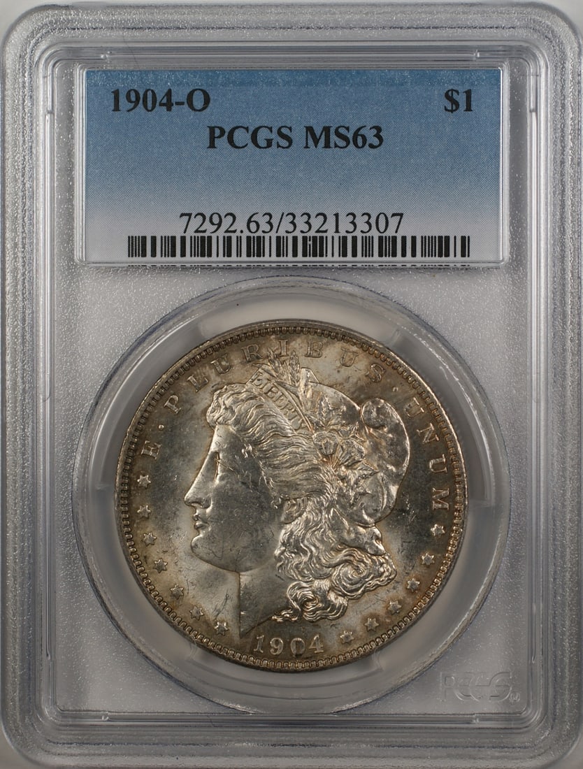 PCGS MS63 1904-O Morgan silver dollar: PCGS MS63 1904-O Morgan silver dollar This is a 1904-O Morgan Silver Dollar graded MS 63 by PCGS. The coin is uncirculated and features the "O" mint mark from New Orleans. It is composed of silver and