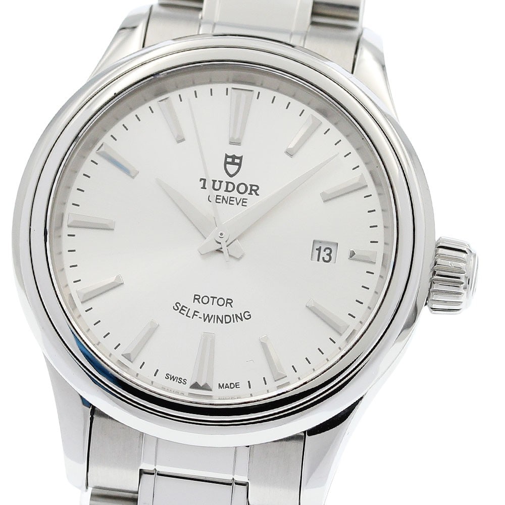 TUDOR Style 12100 Ladies Automatic Date Watch: TUDOR Style 12100 Ladies Automatic Date Watch This Tudor Style Date ladies wristwatch features a stainless steel case and band, complemented by a silver dial. The watch is powered by an automatic move