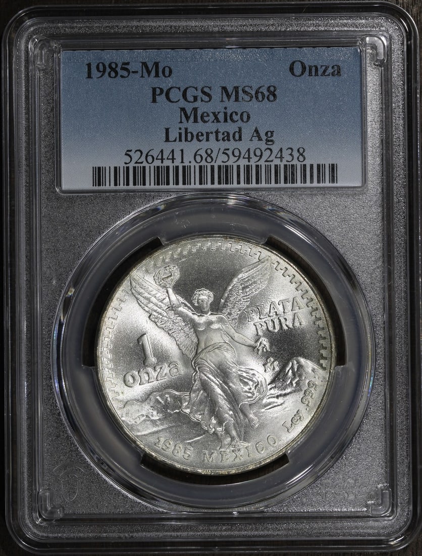 PCGS MS68 1985-Mo Mexico 1 oz Silver Libertad Onza Coin: PCGS MS68 1985-Mo Mexico 1 oz Silver Libertad Onza Coin This is a 1985 Mexico 1 oz Silver Libertad Onza coin certified by PCGS and graded MS 68. It is composed of 0.999 fine silver and was minted by t