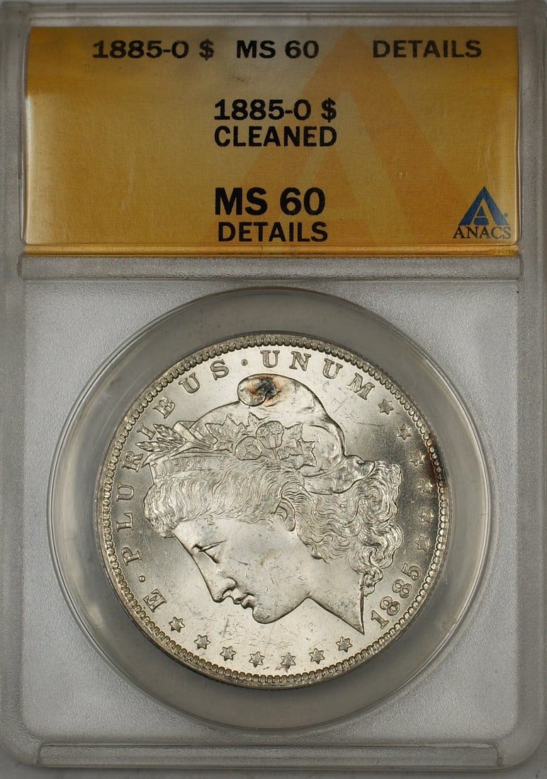 ANACS MS 60 Details 1885-O Morgan Dollar Cleaned: ANACS MS 60 Details 1885-O Morgan Dollar Cleaned This 1885-O Morgan Silver Dollar has been graded MS-60 Details by ANACS and has undergone cleaning. Minted in New Orleans, this uncirculated coin is co