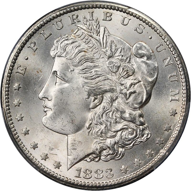 PCGS MS63 1883-CC Morgan Silver Dollar Uncirculated Silver Coin: PCGS MS63 1883-CC Morgan Silver Dollar Uncirculated Silver Coin This 1883-CC Morgan Silver Dollar is graded PCGS MS63 and is described as having superb eye appeal, fantastic luster, and a strong strik
