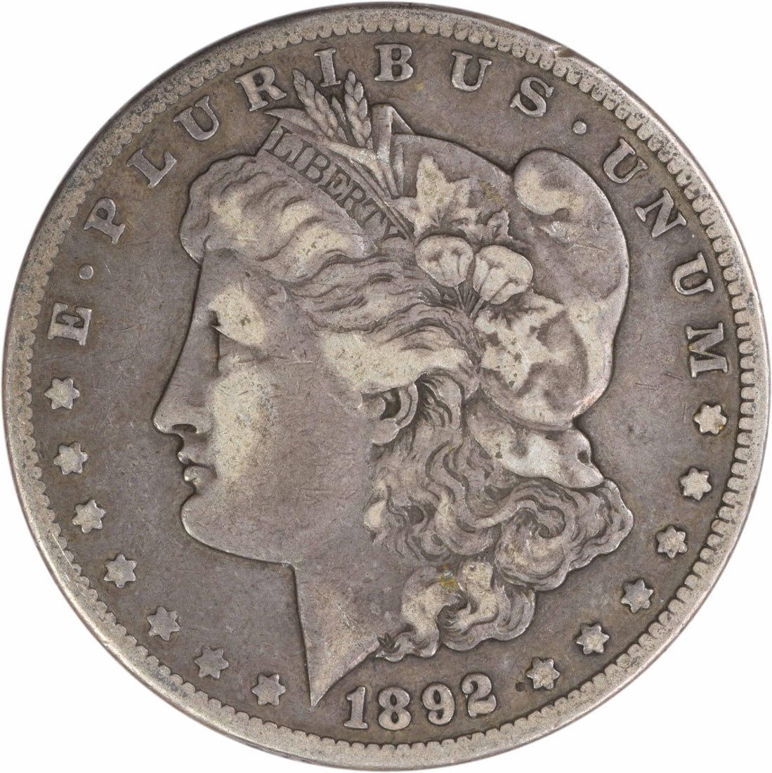 Carson City 1892 Morgan Dollar VF Grade 90 Percent Silver Uncertified: Carson City 1892 Morgan Dollar VF Grade 90 Percent Silver Uncertified This is an 1892-CC Morgan Silver Dollar from the Carson City Mint. The coin is in Very Fine (VF) grade, circulated, and uncertifie