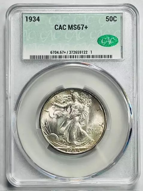 1934 Walking Liberty Half Dollar Certified CAC MS 67+ Silver: 1934 Walking Liberty Half Dollar Certified CAC MS 67+ Silver This 1934 Walking Liberty Half Dollar is a stunning example of American numismatic history, certified by CAC and graded MS 67+. With a comp