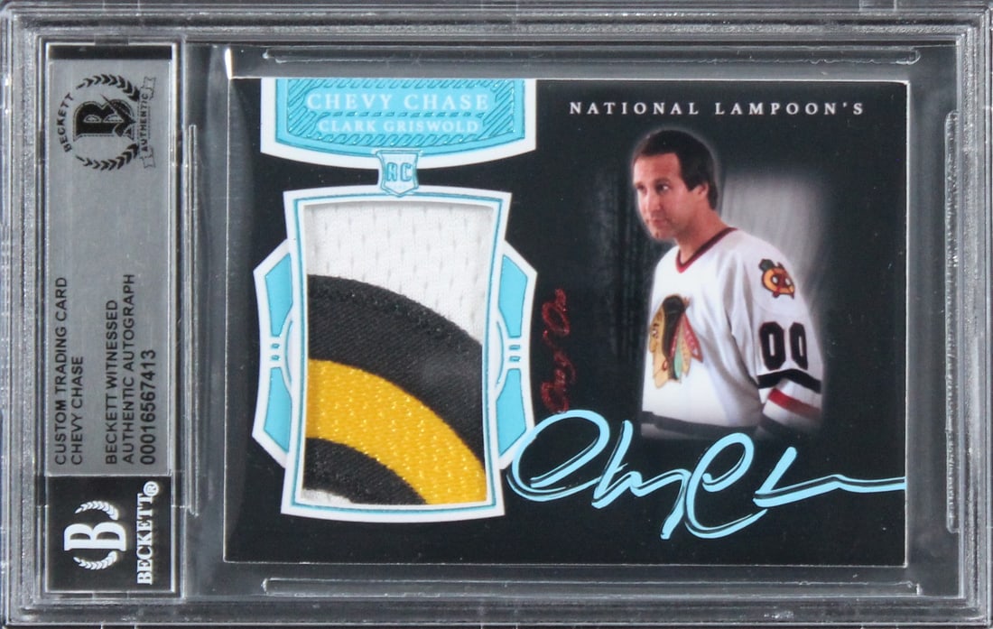 One-of-One Chevy Chase Autographed Relic Card Beckett Authenticated Slab: One-of-One Chevy Chase Autographed Relic Card Beckett Authenticated Slab This is an original autographed relic card personally signed by Chevy Chase from National Lampoon's Christmas Vacation. The car