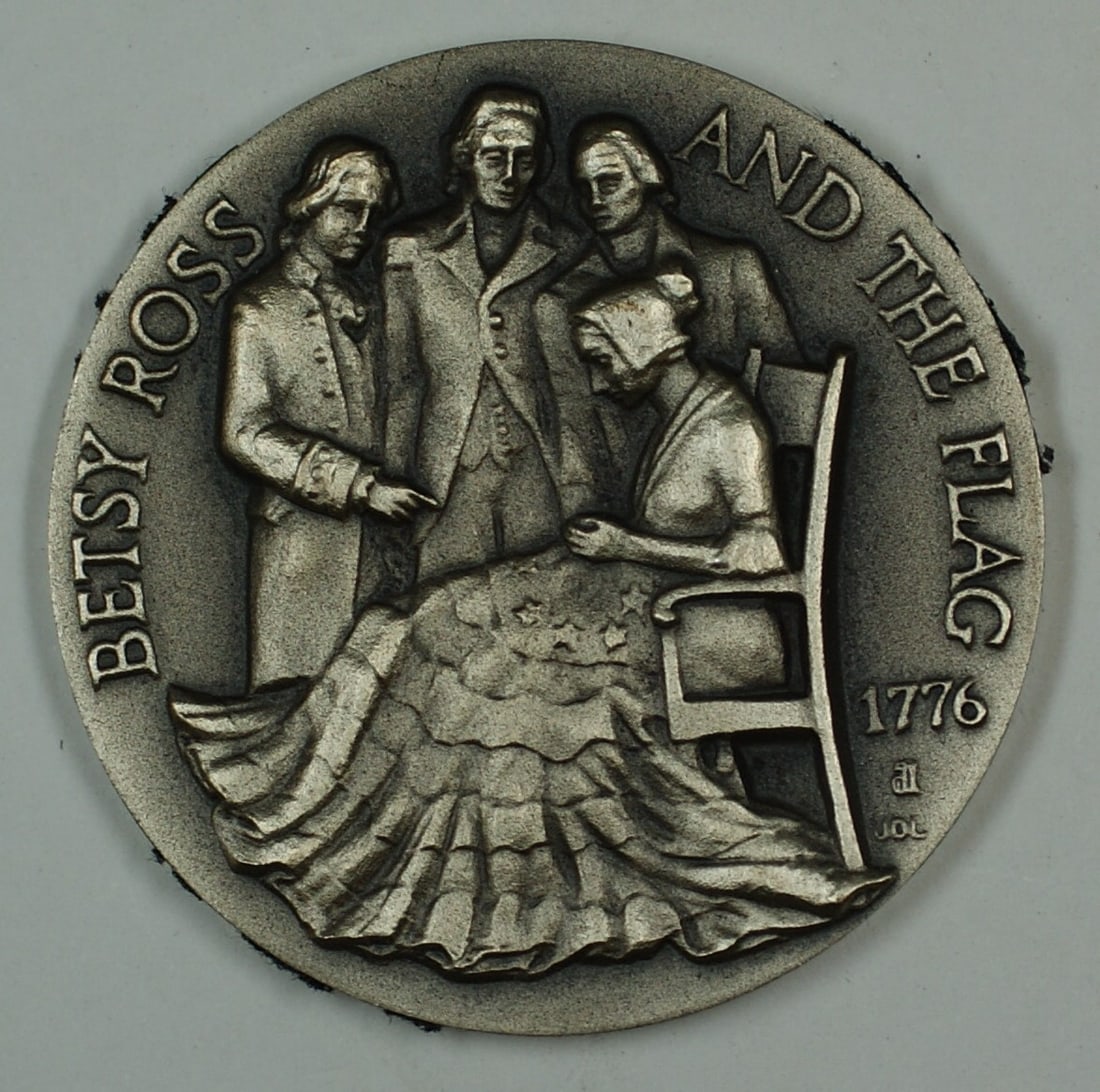 Sterling Silver Medal Depicting Betsy Ross and American Flag: Sterling Silver Medal Depicting Betsy Ross and American Flag This is a Betsy Ross and the Flag medal crafted in sterling silver. The piece originates from the United States and is in pre-owned conditi
