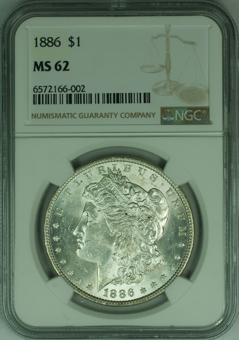 NGC MS-62 1886 Morgan Dollar Silver Coin Uncirculated Philadelphia Mint: NGC MS-62 1886 Morgan Dollar Silver Coin Uncirculated Philadelphia Mint This 1886 Morgan Silver Dollar is graded MS-62 by NGC and was minted in Philadelphia. The coin is composed of silver and has a d