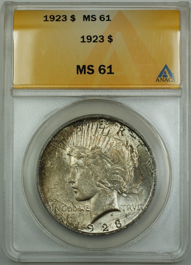 ANACS MS 61 1923 Peace Dollar Silver Coin with Light Toning: ANACS MS 61 1923 Peace Dollar Silver Coin with Light Toning This 1923 Silver Peace Dollar coin is certified by ANACS with a grade of MS-61. Lightly toned, the uncirculated coin was minted in Philadelp