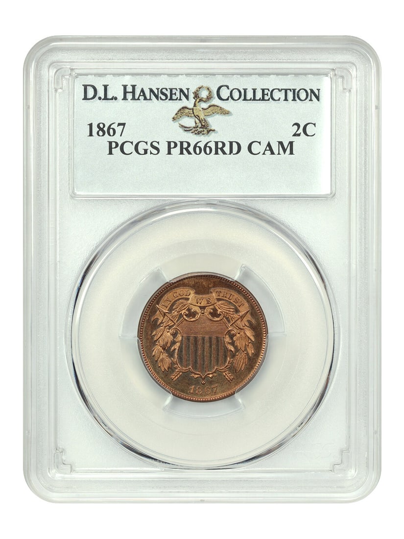 PCGS PR66RD CAM 1867 2C Two Cent ex D.L. Hansen: PCGS PR66RD CAM 1867 2C Two Cent ex D.L. Hansen An 1867 Two Cent coin graded PR66RD CAM by PCGS, certified and encapsulated in a protective holder. It is described as a brilliant cameo example from an