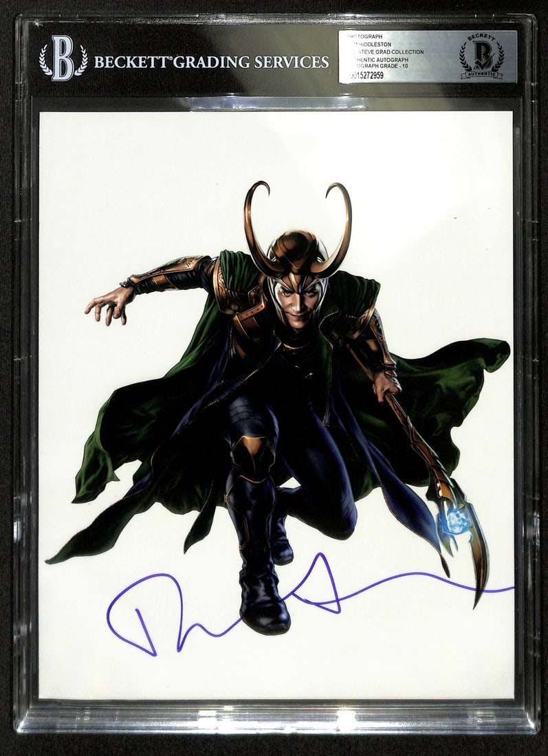 Beckett Slabbed 8x10 Loki Photo Signed by Tom Hiddleston Auto Grade 10: Beckett Slabbed 8x10 Loki Photo Signed by Tom Hiddleston Auto Grade 10 This is an original 8x10 color photograph featuring Tom Hiddleston in his role as Loki, personally signed by the actor in blue pe