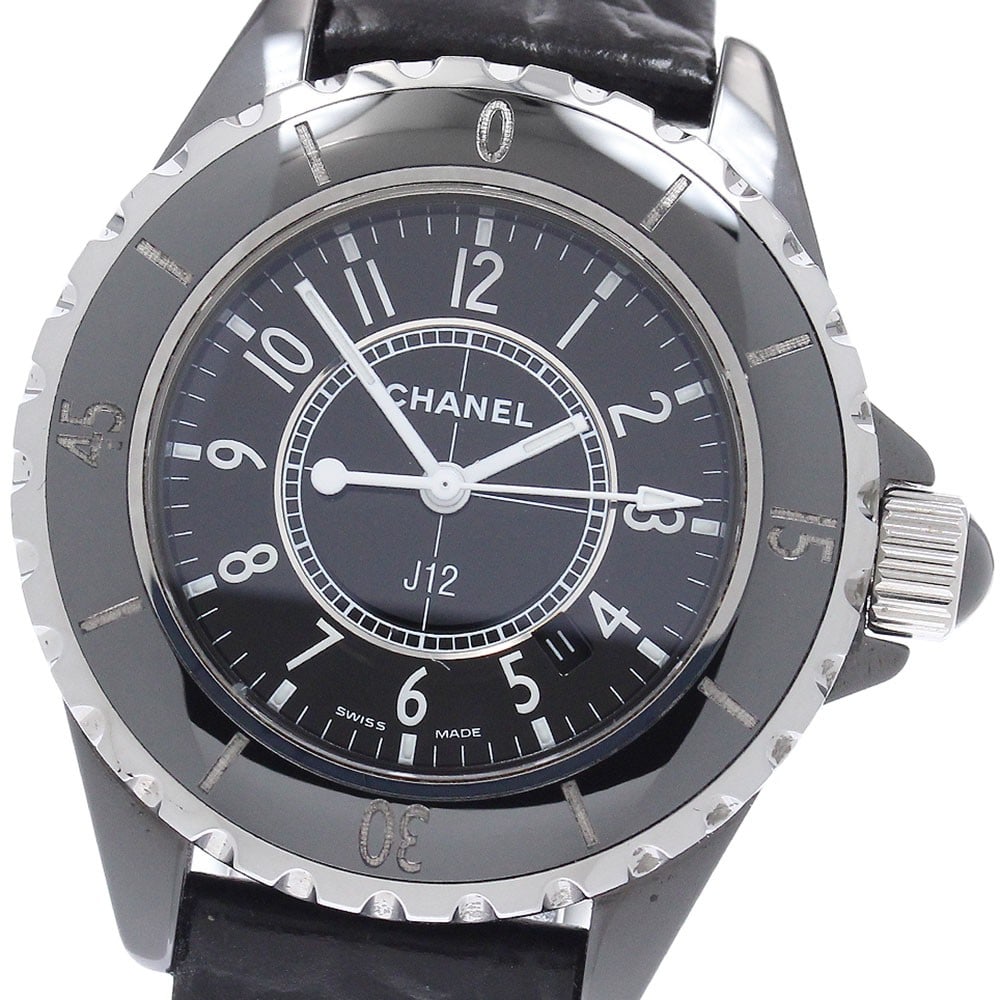 CHANEL J12 Black Ceramic Quartz Ladies Date Watch H0680: CHANEL J12 Black Ceramic Quartz Ladies Date Watch H0680 This CHANEL J12 H0680 ladies wristwatch features a black ceramic and stainless steel case paired with a black leather strap. The watch is powere