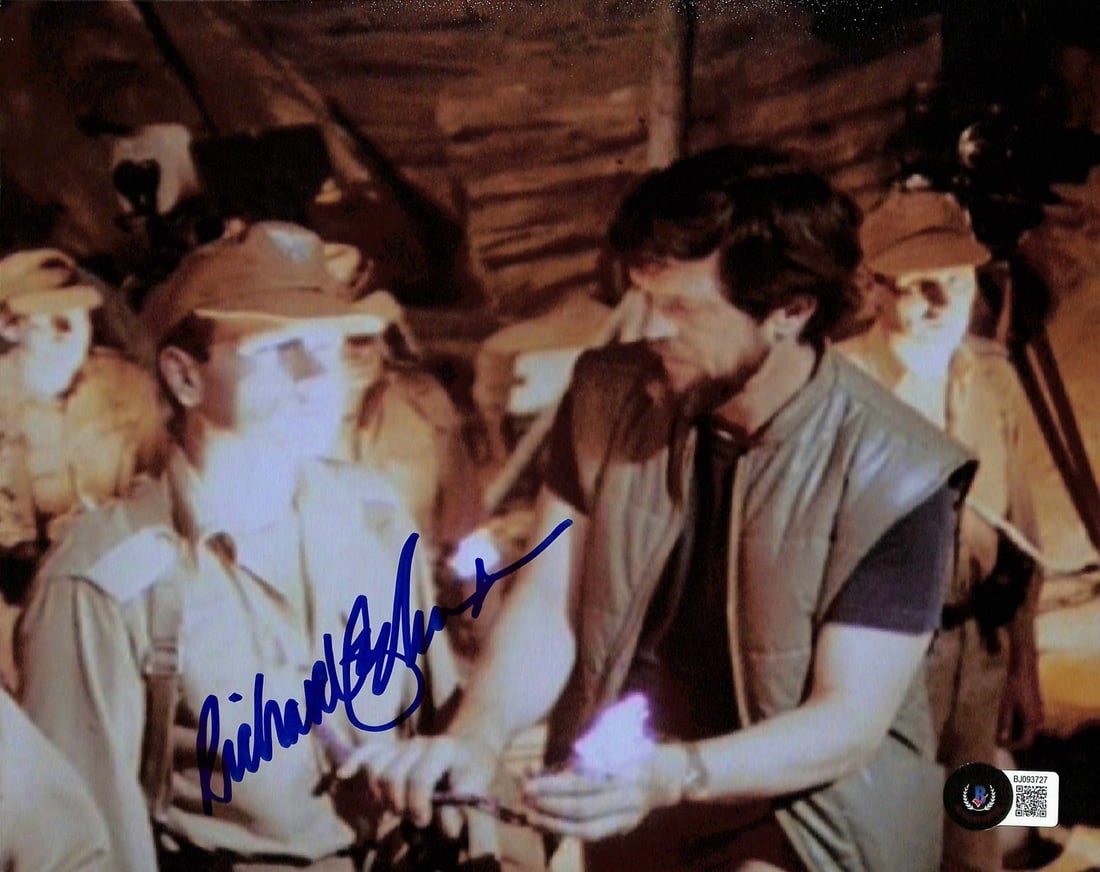Richard Edlund Signed 8x10 Raiders Photo Beckett Certified: Richard Edlund Signed 8x10 Raiders Photo Beckett Certified This remarkable 8x10 photograph captures a behind-the-scenes moment from the iconic film Raiders of the Lost Ark. Signed in bold blue ink by 