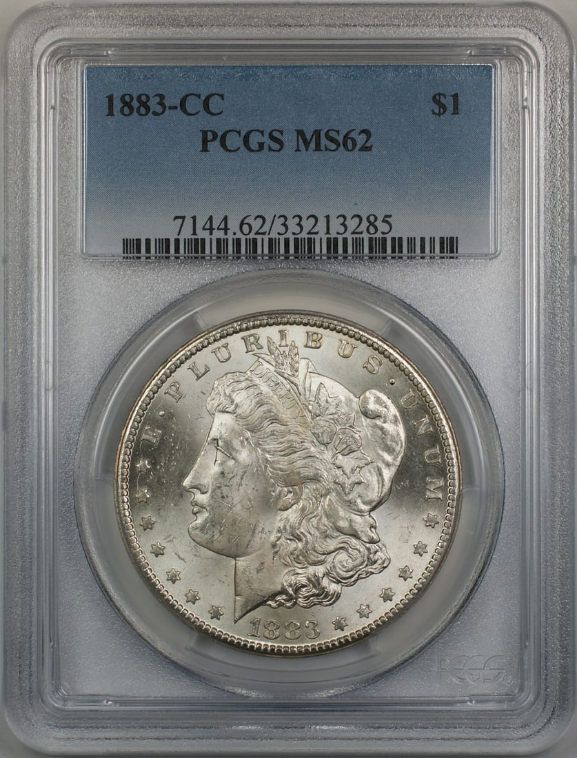 PCGS MS62 1883-CC Morgan Silver Dollar: PCGS MS62 1883-CC Morgan Silver Dollar This is an 1883-CC Morgan Silver Dollar $1 coin, certified by PCGS with a grade of MS 62. Minted in Carson City, this uncirculated coin is composed of silver and