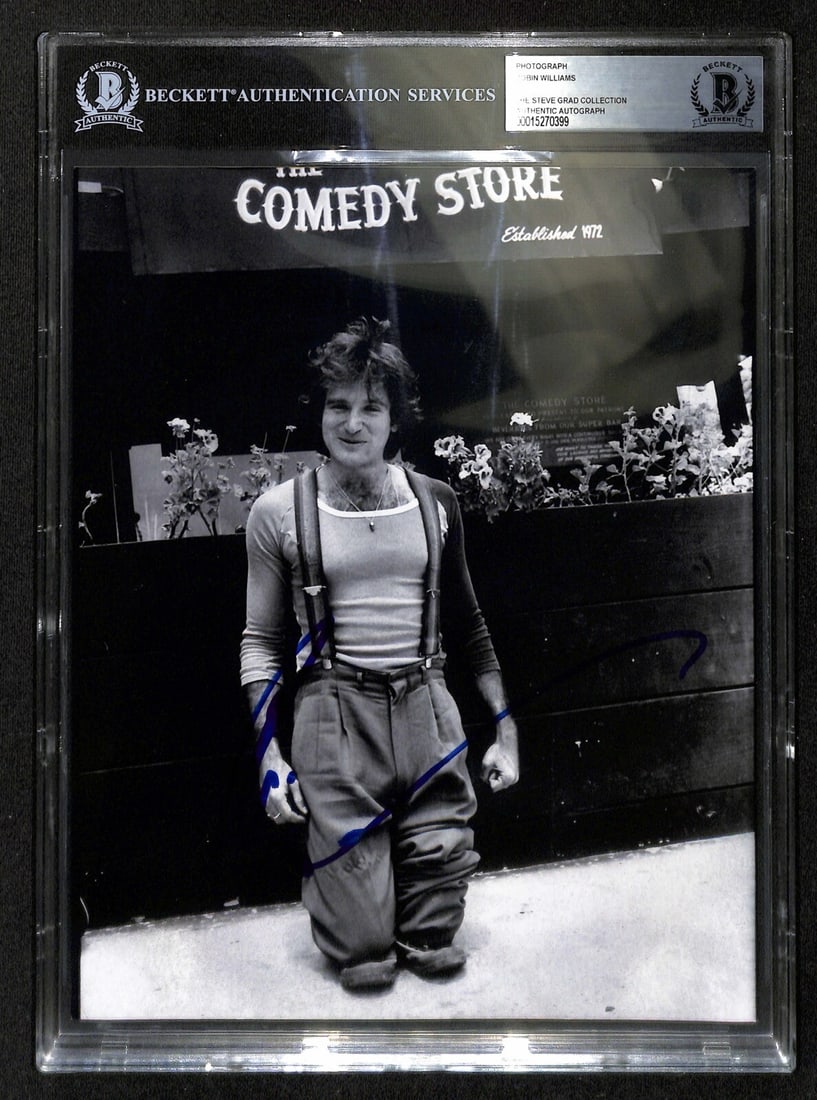 Robin Williams Signed 8x10 Photo Beckett Authenticated at Comedy Store: Robin Williams Signed 8x10 Photo Beckett Authenticated at Comedy Store This is an original 8x10 black and white photograph signed by Robin Williams at the Comedy Store. The autograph is in blue perman