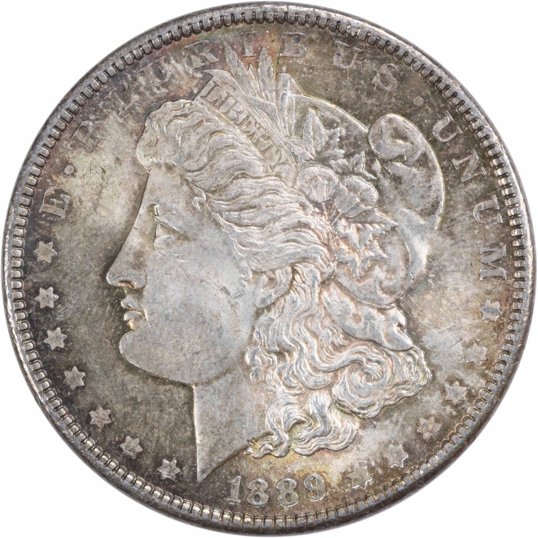 Uncirculated 1889 Morgan Silver Dollar with Toning No Mint Mark: Uncirculated 1889 Morgan Silver Dollar with Toning No Mint Mark This 1889 Morgan Silver Dollar is an uncirculated, pre-owned coin featuring attractive natural toning. Graded as Choice BU, it is compos