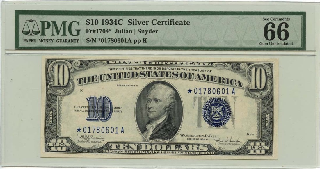 1934C $10 Silver Certificate Fr# 1704* PMG GEM 66 Julian Snyder Signature: 1934C $10 Silver Certificate Fr# 1704* PMG GEM 66 Julian Snyder Signature This 1934 $10 Silver Certificate features the distinguished Blue seal and is a remarkable addition for collectors. Graded PMG 