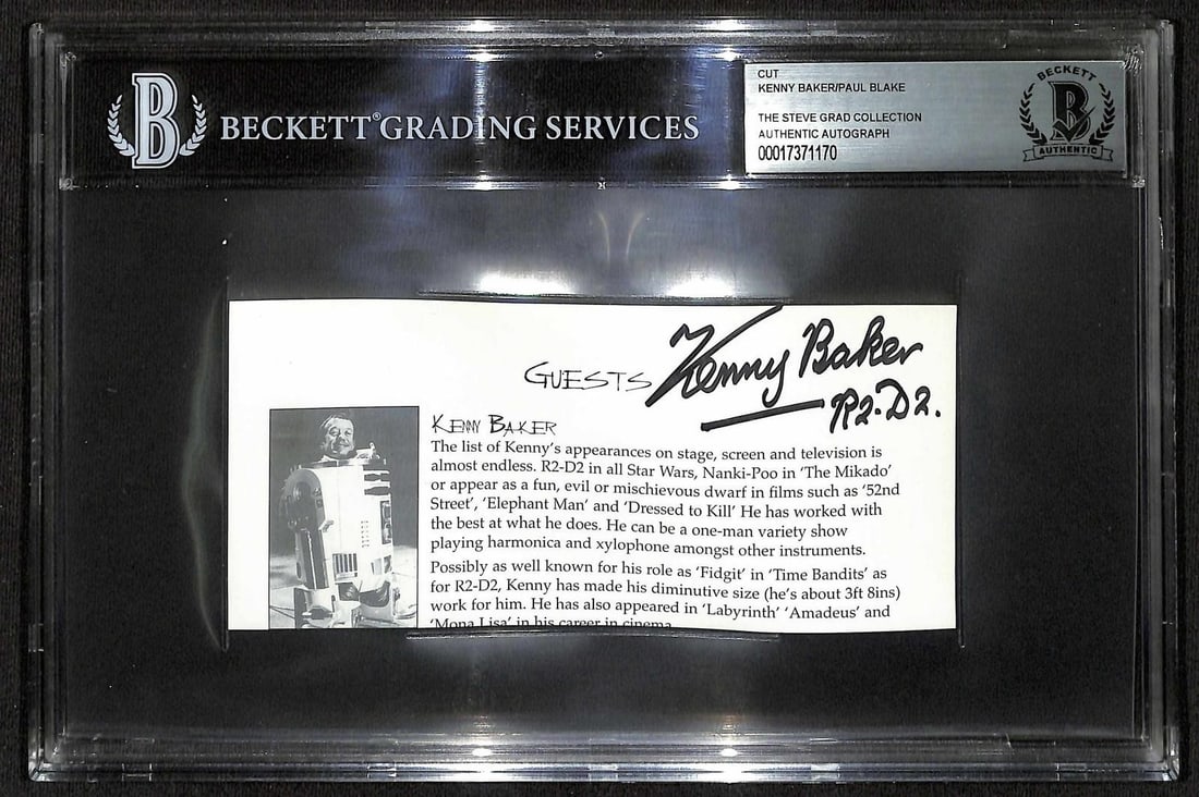 Beckett Encapsulated Kenny Baker R2-D2 Signed Cut Display: Beckett Encapsulated Kenny Baker R2-D2 Signed Cut Display This display features a hand-signed cut by Kenny Baker, the actor who portrayed R2-D2 in the original Star Wars trilogy. The autograph include