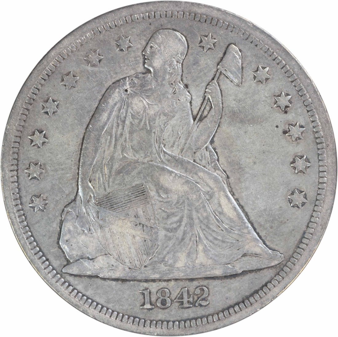 1842 Seated Liberty Silver Dollar VF Grade Philadelphia Mint Uncertified: 1842 Seated Liberty Silver Dollar VF Grade Philadelphia Mint Uncertified This 1842 Liberty Seated Dollar is a circulated coin graded as Choice Very Fine (VF). Struck at the Philadelphia Mint, it is co