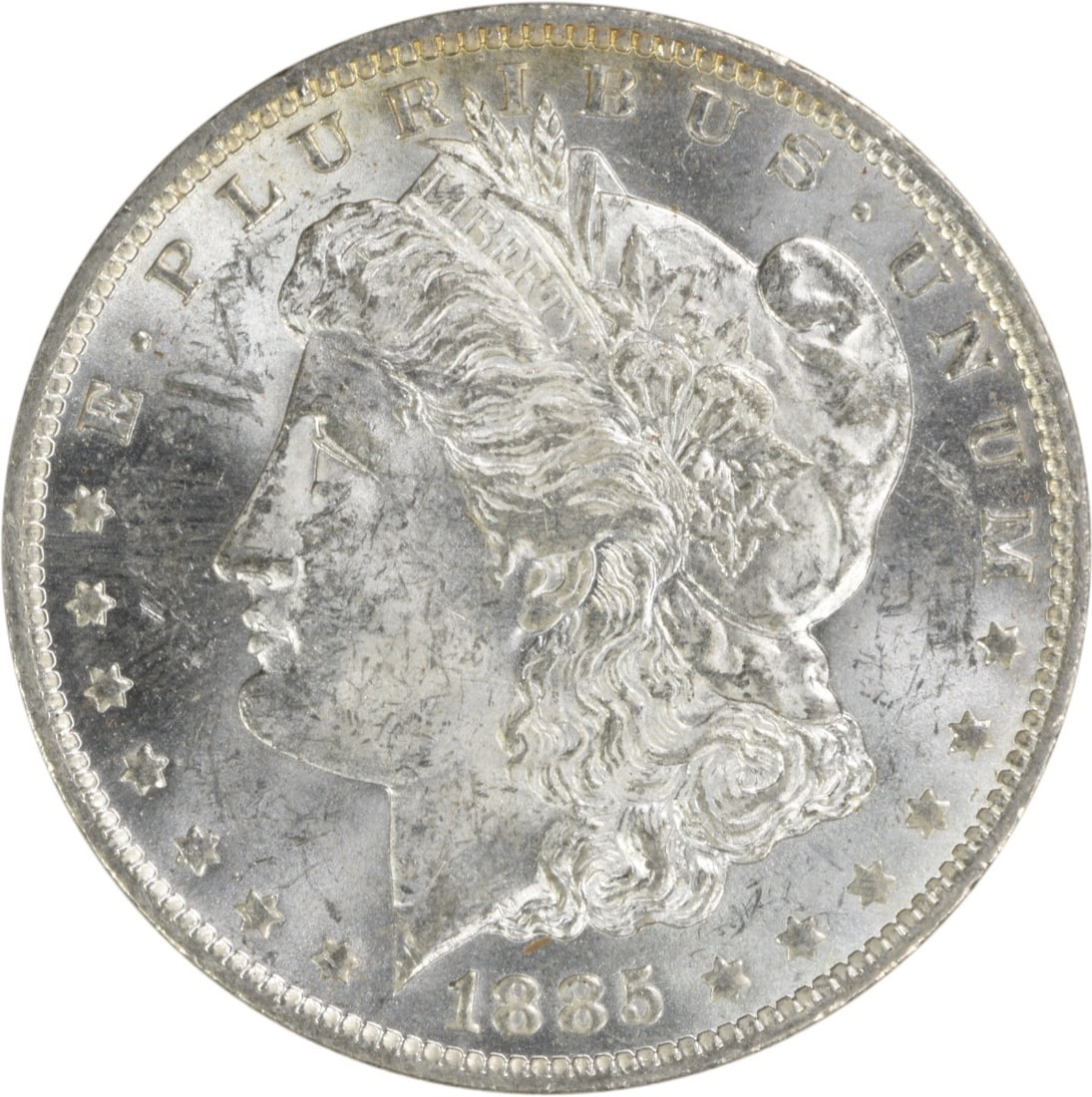 Uncirculated 1885 O Silver Dollar Morgan Type Brilliant Condition: Uncirculated 1885 O Silver Dollar Morgan Type Brilliant Condition This is an 1885-O Morgan Silver Dollar from the New Orleans Mint. The coin is composed of silver and remains in uncirculated condition