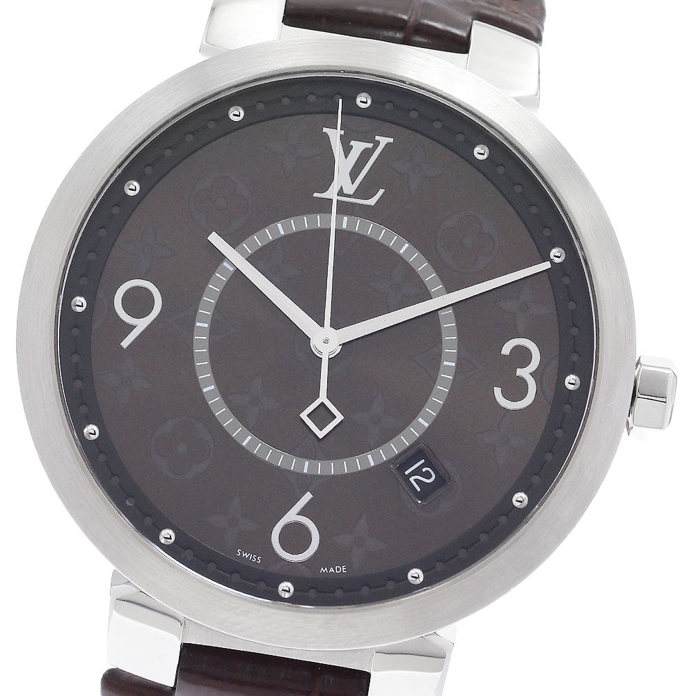 Louis Vuitton Tambour Slim QA005 quartz mens wristwatch with date: Louis Vuitton Tambour Slim QA005 quartz mens wristwatch with date Pre-owned Louis Vuitton Tambour Slim Monogram date quartz men's wristwatch. The watch is identified as a Swiss-made model and features
