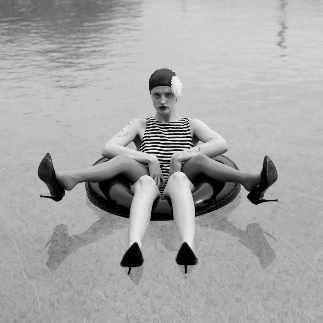 Olha Stepanian Swimming Suit Black and White Photography Ed. 1/7 31 x 31: Olha Stepanian Swimming Suit Black and White Photography Ed. 1/7 31 x 31 Experience the captivating allure of "Swimming Suit," a stunning black and white photographic artwork by Olha Stepanian. This p