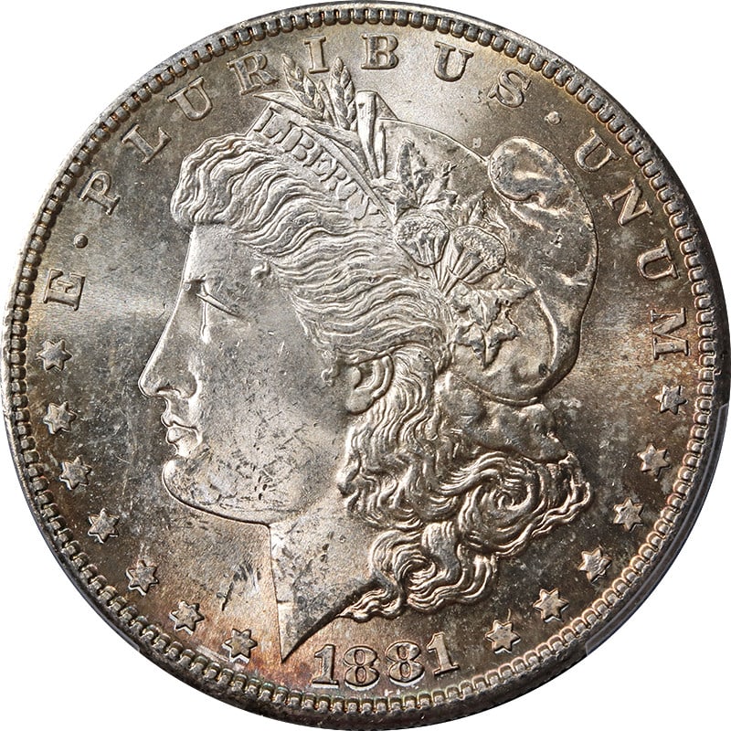 PCGS MS63 1881-S Morgan Dollar with Toned Surface: PCGS MS63 1881-S Morgan Dollar with Toned Surface This 1881-S Morgan Silver Dollar is certified by PCGS with a grade of MS63, indicating it is in uncirculated condition. The coin features attractive t