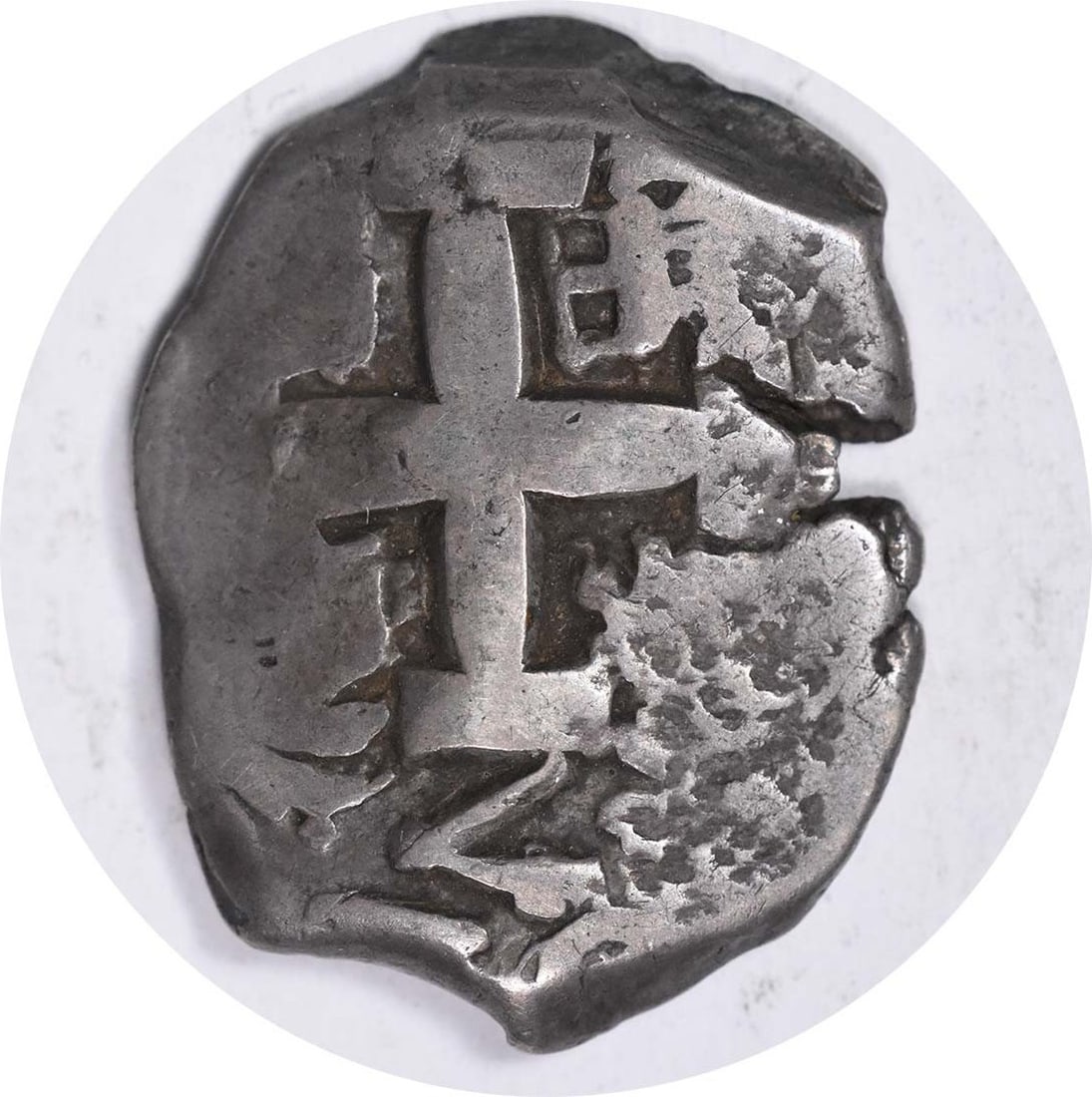 1740s Peru 2 Reales Silver Coin KM32A Uncertified: 1740s Peru 2 Reales Silver Coin KM32A Uncertified This 1740s 2 Reales coin from Peru is a notable piece for collectors. It is made of silver and classified as KM32A. The coin has been circulated and i