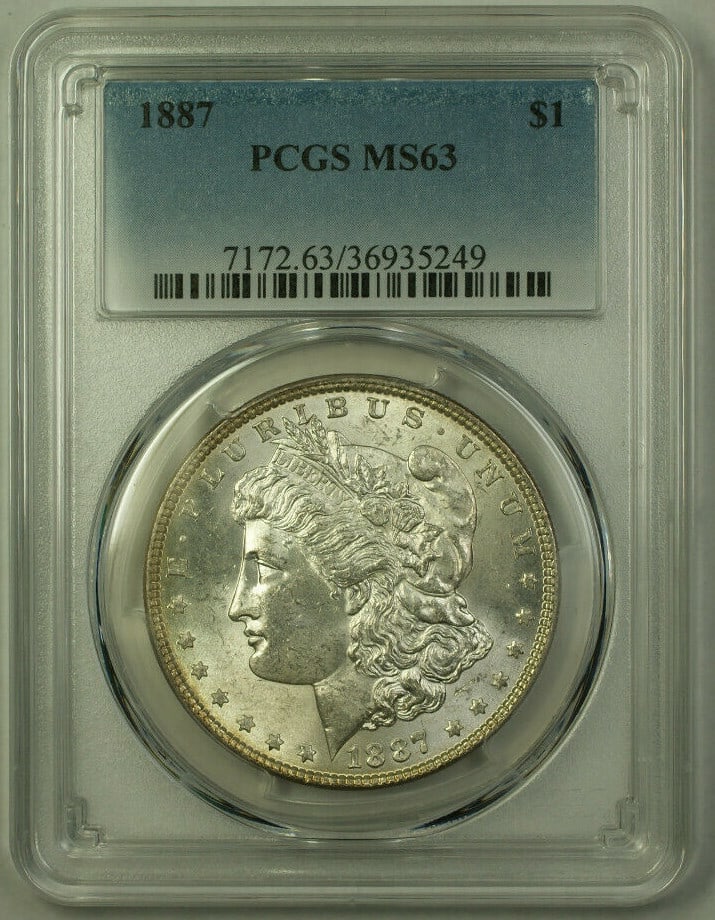 PCGS MS63 1887 Morgan Dollar Silver Coin with Toned Reverse: PCGS MS63 1887 Morgan Dollar Silver Coin with Toned Reverse This is an 1887 Morgan Silver Dollar $1 coin from the United States. Certified by PCGS with a grade of MS-63, this uncirculated coin feature