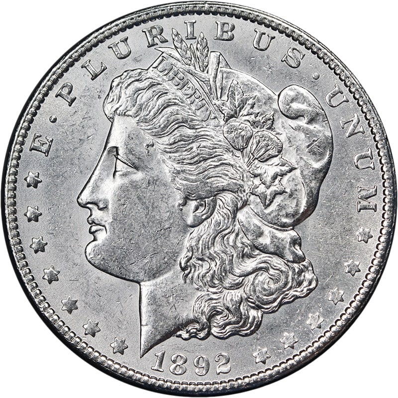 1892 O Morgan Dollar Bright White Nice BU Strike: 1892 O Morgan Dollar Bright White Nice BU Strike This 1892-O Morgan Silver Dollar is an uncirculated coin featuring attractive eye appeal, strong luster, and a sharp strike. It displays bright white c