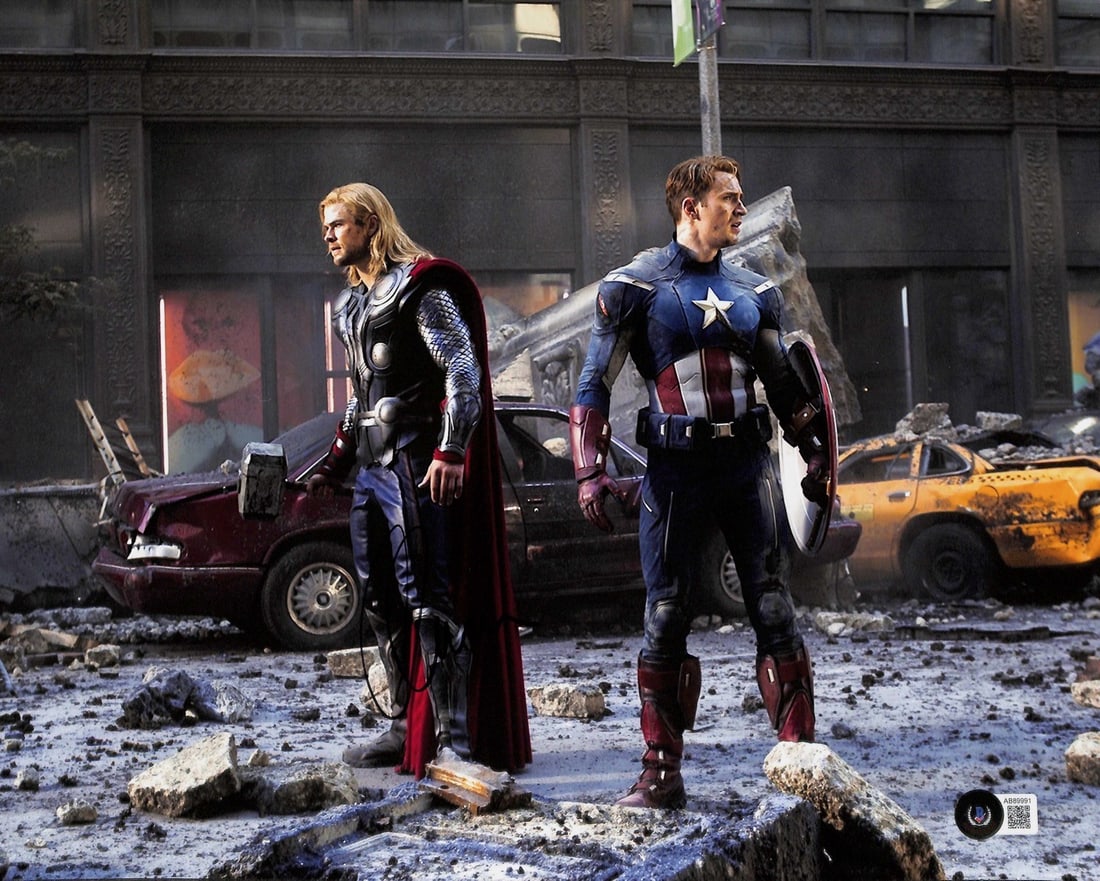 Chris Evans Captain America Signed 11x14 Photo Beckett Certified: Chris Evans Captain America Signed 11x14 Photo Beckett Certified Own a remarkable piece of superhero cinematic history with this signed 11x14 photograph of Chris Evans as Captain America, captured dur
