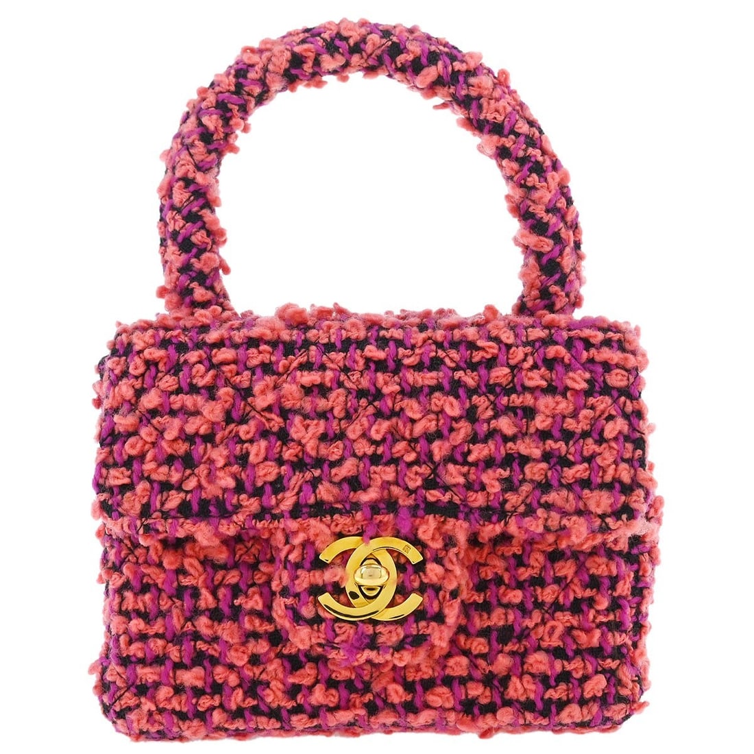 CHANEL Small Pink Tweed Top Handle Bag Turn Lock: CHANEL Small Pink Tweed Top Handle Bag Turn Lock Small Chanel handbag in pink tweed with a top handle and turn-lock closure. The bag features logo quilted accents, pockets inside and out, and a leathe