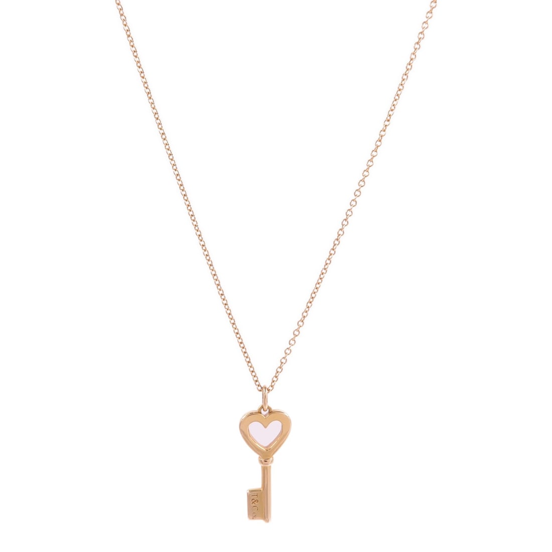 Tiffany Co 18K Rose Gold Heart Key Pendant Necklace: Tiffany Co 18K Rose Gold Heart Key Pendant Necklace A Tiffany & Co. Heart Key Pendant Necklace in 18K pink gold (K18PG/Rose Gold). Designed for women, this necklace features a heart key motif and come