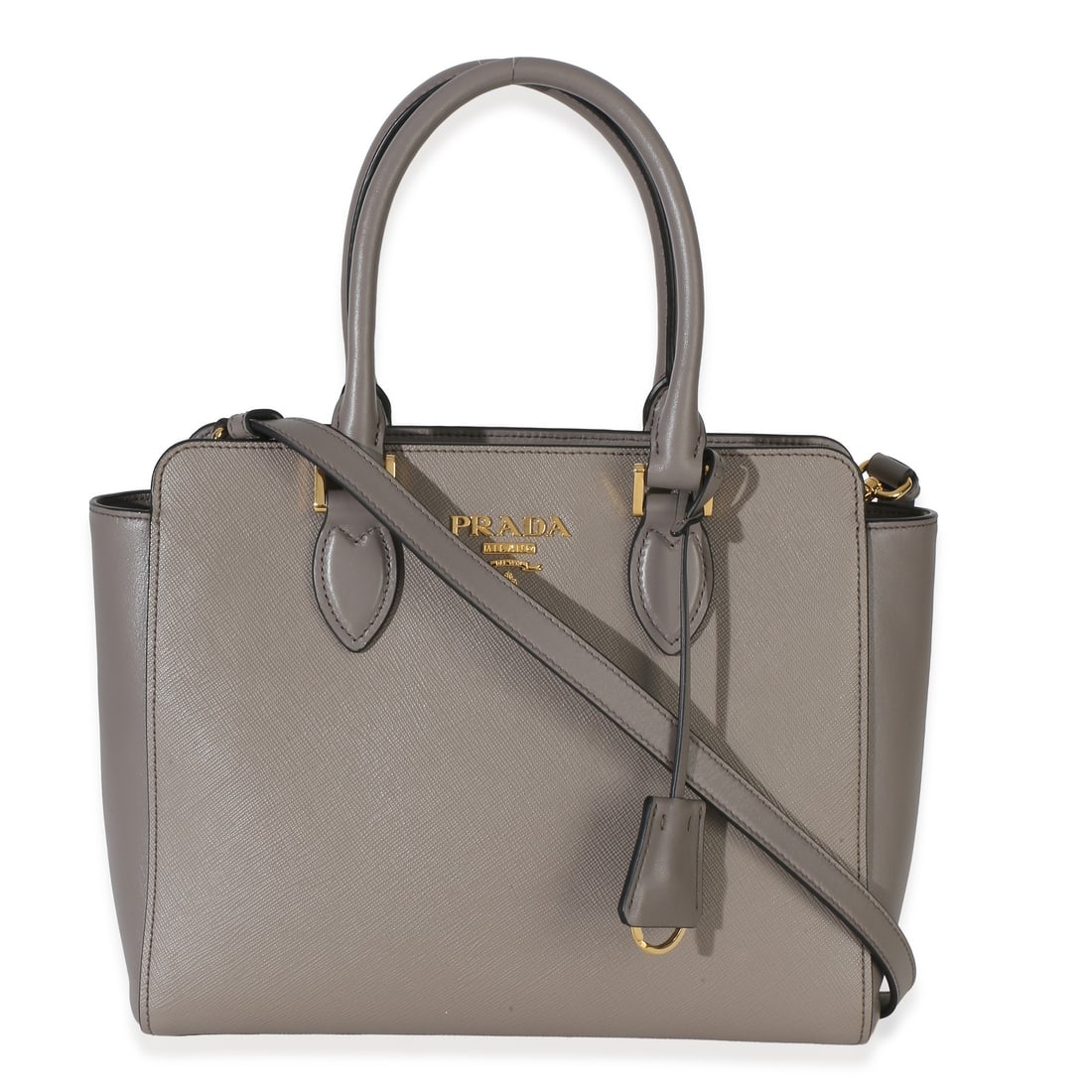 Prada Small Top Handle Tote Gray Leather with Clochette Dustbag: Prada Small Top Handle Tote Gray Leather with Clochette Dustbag Pre-owned Prada Small Top Handle Tote in gray Saffiano soft calfskin. This unisex bag features a structured top handle silhouette with a