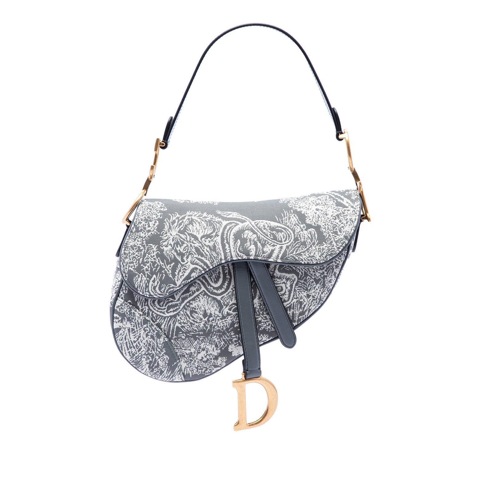 Dior Saddle Bag in Reverse Toile De Jouy Embroidered Canvas: Dior Saddle Bag in Reverse Toile De Jouy Embroidered Canvas Dior Saddle bag in gray embroidered canvas with the Reverse Toile de Jouy design. This bag features a flat leather strap, front flap closure