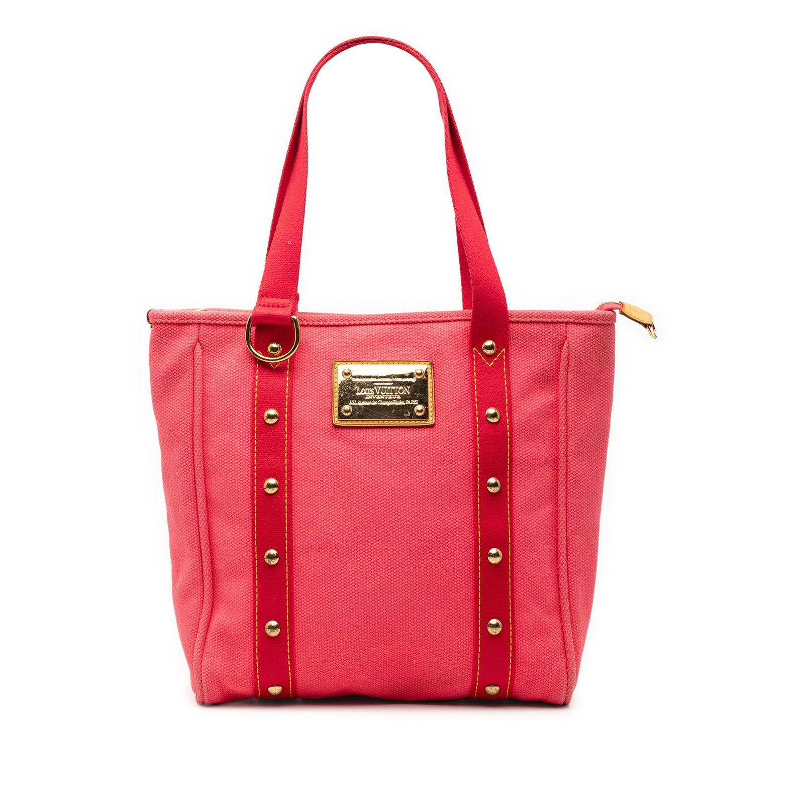 Louis Vuitton Pink Antigua Cabas MM Fabric Tote: Louis Vuitton Pink Antigua Cabas MM Fabric Tote The Louis Vuitton Antigua Cabas MM is a pink fabric shoulder bag featuring a canvas body, flat shoulder straps, a top zip closure, and interior slip poc