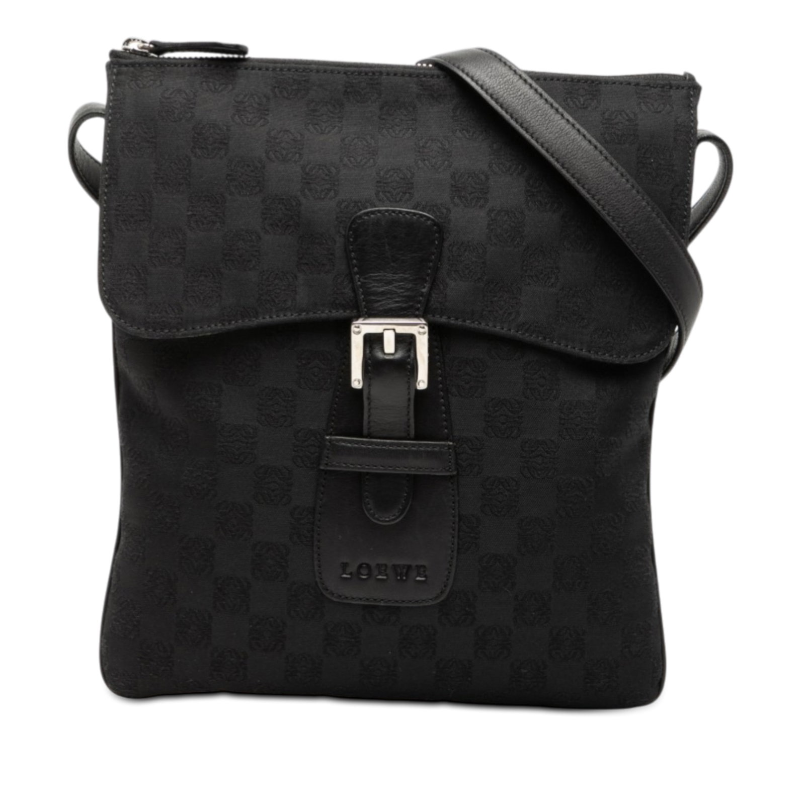 Loewe Anagram Black Canvas Crossbody Bag with Leather Strap: Loewe Anagram Black Canvas Crossbody Bag with Leather Strap This LOEWE Anagram Canvas Crossbody features a canvas exterior in black with an adjustable flat leather shoulder strap. The bag is designed 