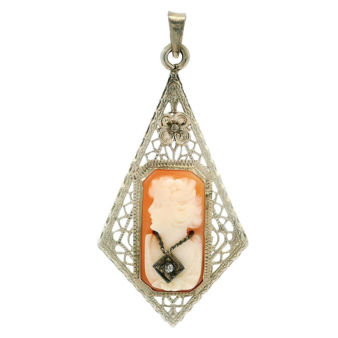 Antique 14K White Gold Cameo Diamond Filigree Pendant: Antique 14K White Gold Cameo Diamond Filigree Pendant This exquisite antique pendant features a beautifully carved shell cameo, showcasing a rectangular shape with dimensions of approximately 16.8x8.5