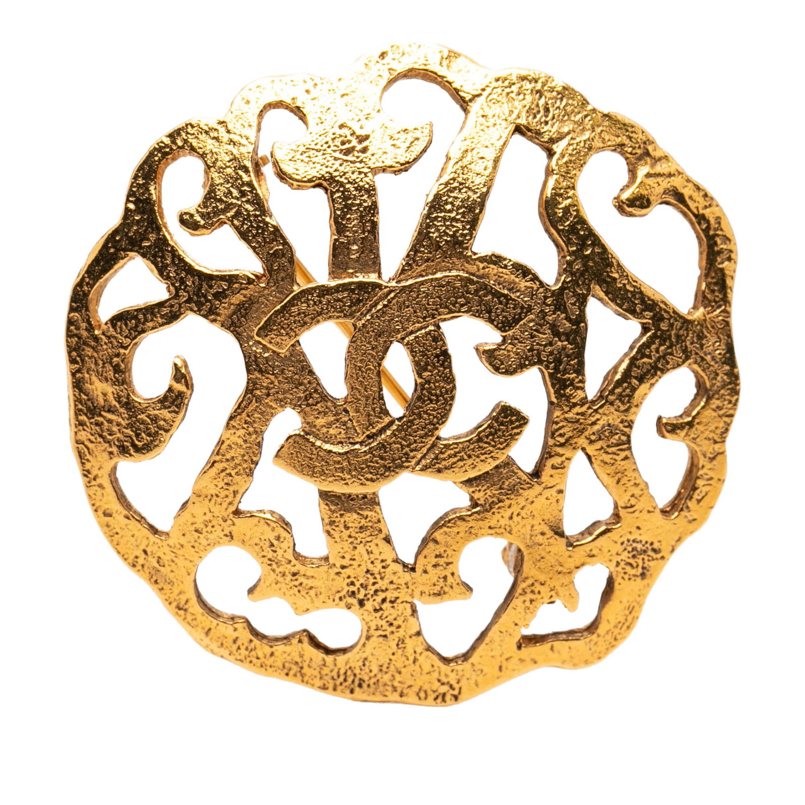 Chanel CC Gold Tone Metal Brooch: Chanel CC Gold Tone Metal Brooch This Chanel CC brooch features a gold-tone metal construction with a classic back pin closure. The piece is designed in a costume jewelry style and showcases the iconi