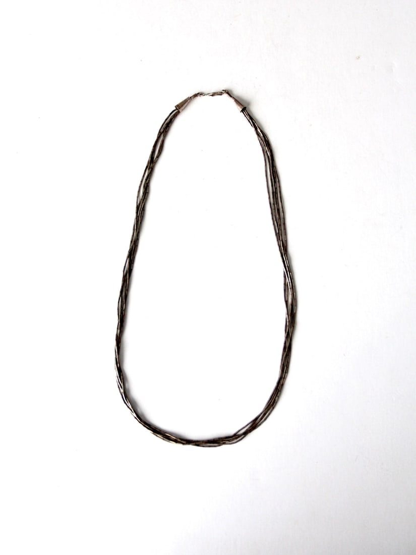 Vintage Liquid Silver Necklace Five Slinky Beaded Strands 24.5 Inch: Vintage Liquid Silver Necklace Five Slinky Beaded Strands 24.5 Inch This vintage liquid silver necklace showcases five elegant slinky silver heshi beaded strands, beautifully crafted to create a flowi