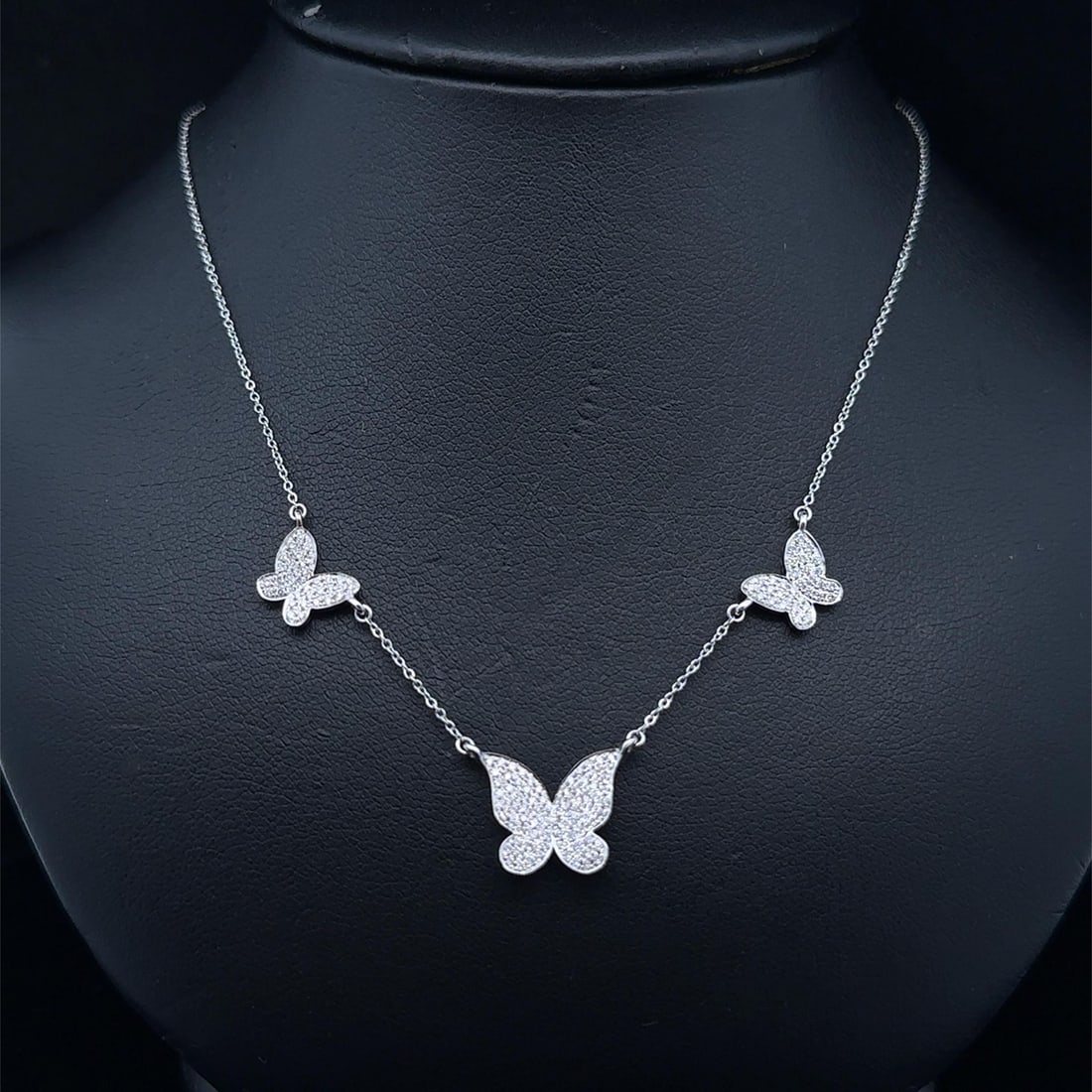 Adjustable 14k White Gold Diamond Butterfly Pendant Necklace with Pave Setting: Adjustable 14k White Gold Diamond Butterfly Pendant Necklace with Pave Setting This elegant necklace features three butterfly pendants crafted in solid 14k white gold, adorned with a total of 0.41 car