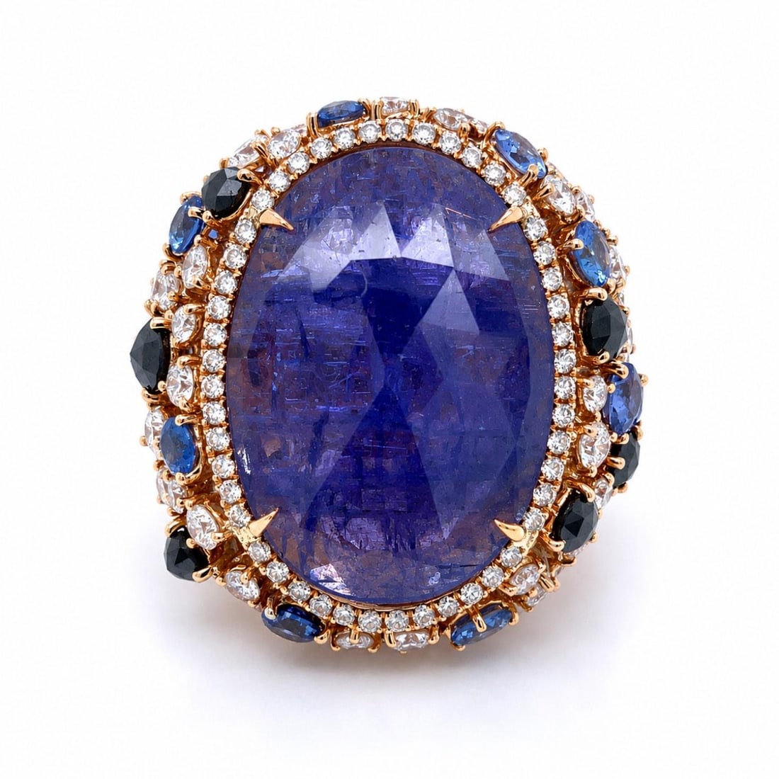18K Gold Tanzanite Diamond Ring Size 7.75: 18K Gold Tanzanite Diamond Ring Size 7.75 This elegant ring is crafted from 18K yellow gold and features a central tanzanite gemstone of approximately 10.00 carats. The design is further enhanced by a