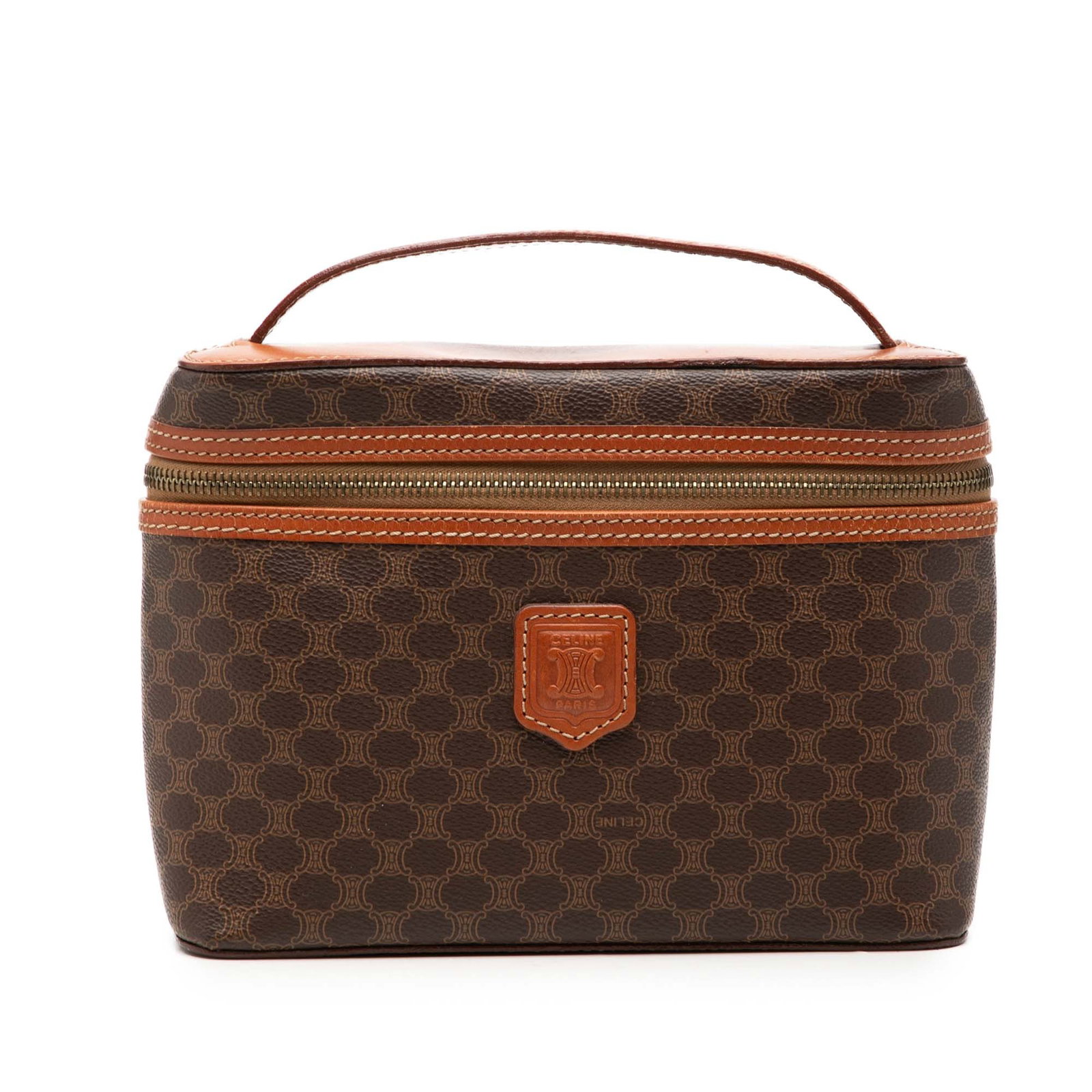 Celine Macadam Vanity Bag in Brown Coated Canvas: Celine Macadam Vanity Bag in Brown Coated Canvas Celine Macadam vanity bag in brown coated canvas with leather trim and a flat leather handle. The bag features a top zip-around closure and is made in 