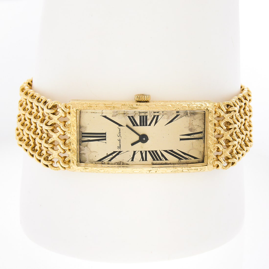 Bueche Girod 18k Gold Caliber 67 Rectangular Vintage Wristwatch: Bueche Girod 18k Gold Caliber 67 Rectangular Vintage Wristwatch This exquisite vintage Bueche Girod wristwatch features a unique rectangular curved design crafted from solid 18k yellow gold. The watch