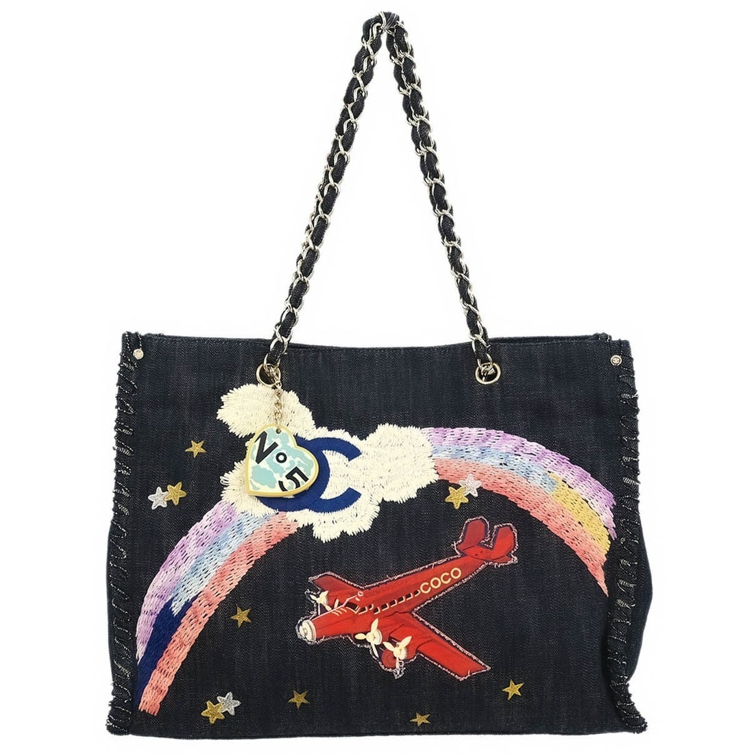 CHANEL Night Flight Denim Tote in Navy with Dust Bag: CHANEL Night Flight Denim Tote in Navy with Dust Bag Large Chanel Night Flight tote handbag in navy denim with double handles and a magnetic closure. This women's tote is made in Italy and features on