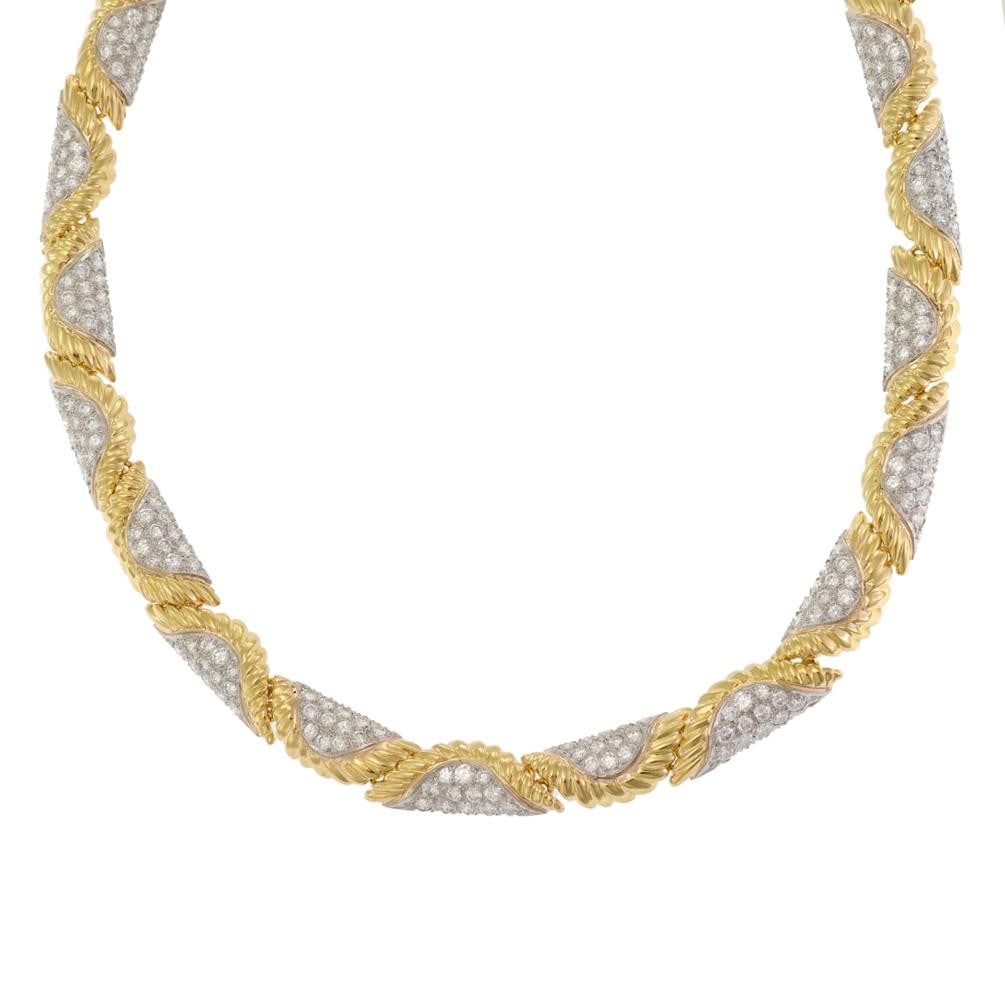 Exquisite 18k Gold Platinum Diamond Leaf Collar Necklace 14ct: Exquisite 18k Gold Platinum Diamond Leaf Collar Necklace 14ct This exquisite collar necklace showcases a stunning design crafted from platinum and 18k yellow gold. It features a beautifully curved lea
